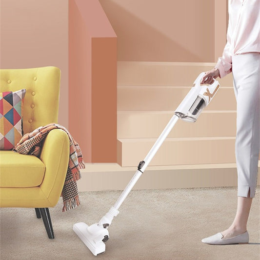 Cordless Handheld Vacuum Cleaner being used in a stylish living room with yellow sofa and stairs.